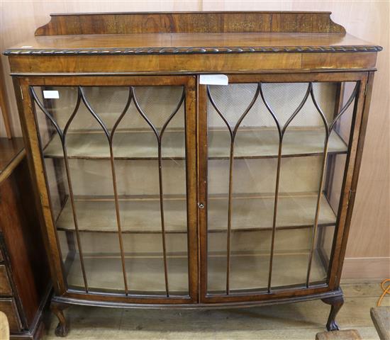 A mahogany bow front display cabinet, W.121cm